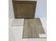 Interior design finishes featuring cabinet paint, countertop sample, and wood flooring for a stylish home at 90 Cordoba Dr, Franklinton, NC 27525