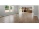 Open floor plan: view of the living room with beautiful flooring leading to a well appointed kitchen at 90 Cordoba Dr, Franklinton, NC 27525