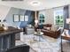 Cozy living room featuring stylish decor, a comfortable couch, and an eye-catching accent wall design at 90 Cordoba Dr, Franklinton, NC 27525