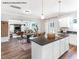 Open-concept area with a dining area, a kitchen island with a dark countertop, and a spacious living room at 90 Cordoba Dr, Franklinton, NC 27525