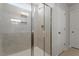 Modern bathroom with tiled shower and glass door at 90 Cordoba Dr, Franklinton, NC 27525