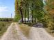 Long driveway leading up to the home at 9400 Wheelers Church E Rd, Hurdle Mills, NC 27541