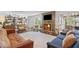 Inviting living room features a stone fireplace and comfortable seating at 9400 Wheelers Church E Rd, Hurdle Mills, NC 27541