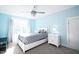 Cozy bedroom featuring a ceiling fan, nice window and light-toned walls at 1023 Laura Johnson Rd, Pittsboro, NC 27312