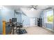 Bright office space with a large window, modern desk, and ample natural light at 1023 Laura Johnson Rd, Pittsboro, NC 27312