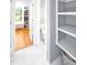 Organized walk-in closet features custom shelving, shoe storage, and a window at 1023 Laura Johnson Rd, Pittsboro, NC 27312