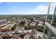 Aerial view of city showcasing surrounding neighborhood and skyline on a bright day at 110 N Corcoran St # 2101, Durham, NC 27701