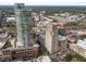 The building is located in a bustling neighborhood with multiple establishments at 110 N Corcoran St # 2101, Durham, NC 27701