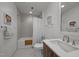 Neutral toned bathroom featuring a shower-tub combo and single sink vanity at 110 N Corcoran St # 2101, Durham, NC 27701