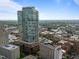 Striking high-rise building with modern architecture and city views on a beautiful sunny day at 110 N Corcoran St # 2101, Durham, NC 27701