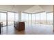 Open kitchen view with an island and floor-to-ceiling windows at 110 N Corcoran St # 2101, Durham, NC 27701