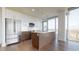 Modern kitchen with stainless steel appliances and a spacious center island at 110 N Corcoran St # 2101, Durham, NC 27701