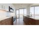 Contemporary kitchen featuring stainless steel appliances and a white subway tile backsplash at 110 N Corcoran St # 2101, Durham, NC 27701