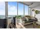 Bright living room featuring floor-to-ceiling windows, neutral tones, and stylish decor at 110 N Corcoran St # 2101, Durham, NC 27701