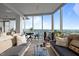 Cozy living room with a view, filled with soft furniture and accessories at 110 N Corcoran St # 2101, Durham, NC 27701