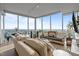 Inviting living room with floor-to-ceiling windows offering panoramic views at 110 N Corcoran St # 2101, Durham, NC 27701