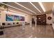 Impressive lobby with modern artwork and seating area for residents and guests at 110 N Corcoran St # 2101, Durham, NC 27701