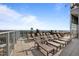 Relax on the rooftop lounge in a lounge chair and enjoy expansive views at 110 N Corcoran St # 2101, Durham, NC 27701