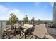 Relax on this rooftop patio offering plentiful seating, lush landscaping and gorgeous panoramic views at 110 N Corcoran St # 2101, Durham, NC 27701