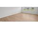 Bedroom with light wood floors and bright natural light at 1121 Landen Creek Ln, Zebulon, NC 27597