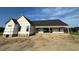 Exterior of the new construction home showing a wide view of the back porch at 11226 Old Beulah Rd, Kenly, NC 27542