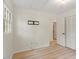 This bedroom offers wood flooring and an interior closet for storage solutions at 1209 Shincliffe Ct, Cary, NC 27511