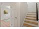 Hallway with stairs and modern flooring at 1209 Shincliffe Ct, Cary, NC 27511