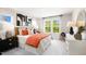Comfortable bedroom with a colorful decor, bedside tables, and modern furnishings, creating a relaxing space at 1248 Hardin Hill Ln, Knightdale, NC 27545