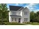 Charming two-story home with white siding, a dark roof, and a landscaped front yard at 1248 Hardin Hill Ln, Knightdale, NC 27545