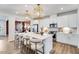 Bright kitchen with a large island with seating and stainless steel appliances at 1248 Hardin Hill Ln, Knightdale, NC 27545