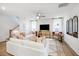 Bright living room featuring modern decor, wood floors, and lots of natural light at 1248 Hardin Hill Ln, Knightdale, NC 27545