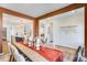 This dining area boasts modern lighting fixtures, seamlessly connected to an open concept kitchen at 1268 Hardin Hill Ln, Knightdale, NC 27545