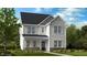 Charming two-story home with stone accents and a covered front porch provides an inviting curb appeal at 1268 Hardin Hill Ln, Knightdale, NC 27545