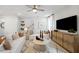 The living room features modern decor, a large TV, and an attractive entertainment center at 1268 Hardin Hill Ln, Knightdale, NC 27545