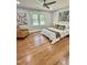 Bedroom with a window and a chair next to the comfortable bed, offering a cozy and inviting atmosphere at 131 Rosewood Dr Dr, Roxboro, NC 27573