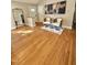 Open-concept living area with hardwood floors and modern decor at 131 Rosewood Dr Dr, Roxboro, NC 27573