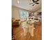 Bright living room with hardwood floors, modern decor, and large windows at 131 Rosewood Dr Dr, Roxboro, NC 27573