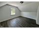 Bright bedroom featuring clean, neutral paint colors and wood laminate flooring at 1336 Hill St, Rocky Mount, NC 27801