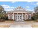 Community clubhouse featuring elegant columns, arched windows, and a welcoming entrance at 134 Barclay Valley Dr, Cary, NC 27519