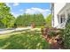 Well-maintained front yard with flowers and landscaping, enhancing the home's curb appeal at 134 Barclay Valley Dr, Cary, NC 27519