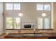 Stylish kitchen featuring granite countertops, double sink, and natural light from surrounding windows at 134 Barclay Valley Dr, Cary, NC 27519