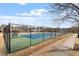 Well-maintained community tennis court with a high fence, ideal for sports and recreation at 134 Barclay Valley Dr, Cary, NC 27519
