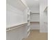 Walk-in closet with custom shelving and ample storage, offering an organized wardrobe solution at 134 Barclay Valley Dr, Cary, NC 27519