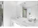 Bright bathroom featuring a double vanity with modern fixtures and a sleek, frameless shower at 1533 Crescent Townes Way, Raleigh, NC 27604