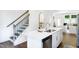 Modern kitchen features stainless steel appliances, a quartz countertop, and new cabinets at 1533 Crescent Townes Way, Raleigh, NC 27604