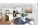 Open-concept kitchen with eat-in dining area and stainless steel appliances at 1533 Crescent Townes Way, Raleigh, NC 27604