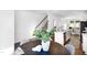 Bright living area featuring hardwood floors and an open floor plan at 1533 Crescent Townes Way, Raleigh, NC 27604