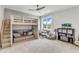 Bedroom features a lofted bed, lounging area, desk, and storage, illuminated by natural light at 1633 Estate Valley Ln, Raleigh, NC 27613