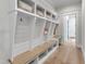 Functional mudroom with custom built-in storage, seating, and easy access to the home at 1633 Estate Valley Ln, Raleigh, NC 27613