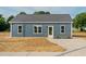 Charming single story home featuring a concrete driveway and minimalist landscaping at 19 Southern Village Dr, Roxboro, NC 27573